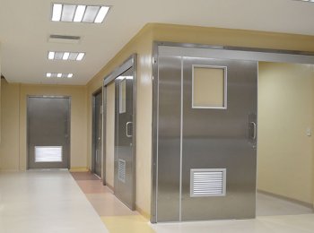 PUERTAS ABATIBLES DE LAMINA DE ACERO PORCELANIZADO