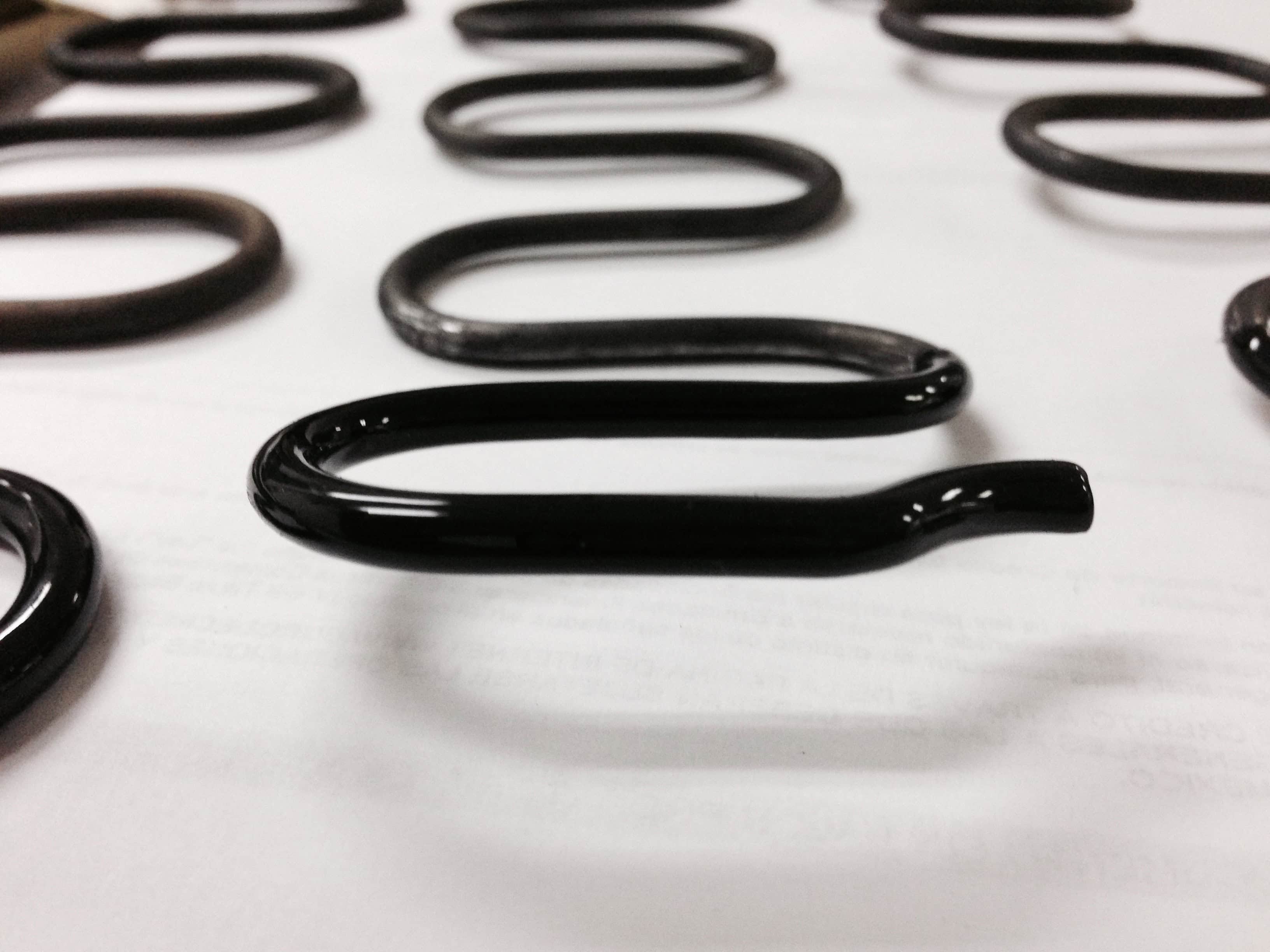 Resortes con recubrimiento plastico