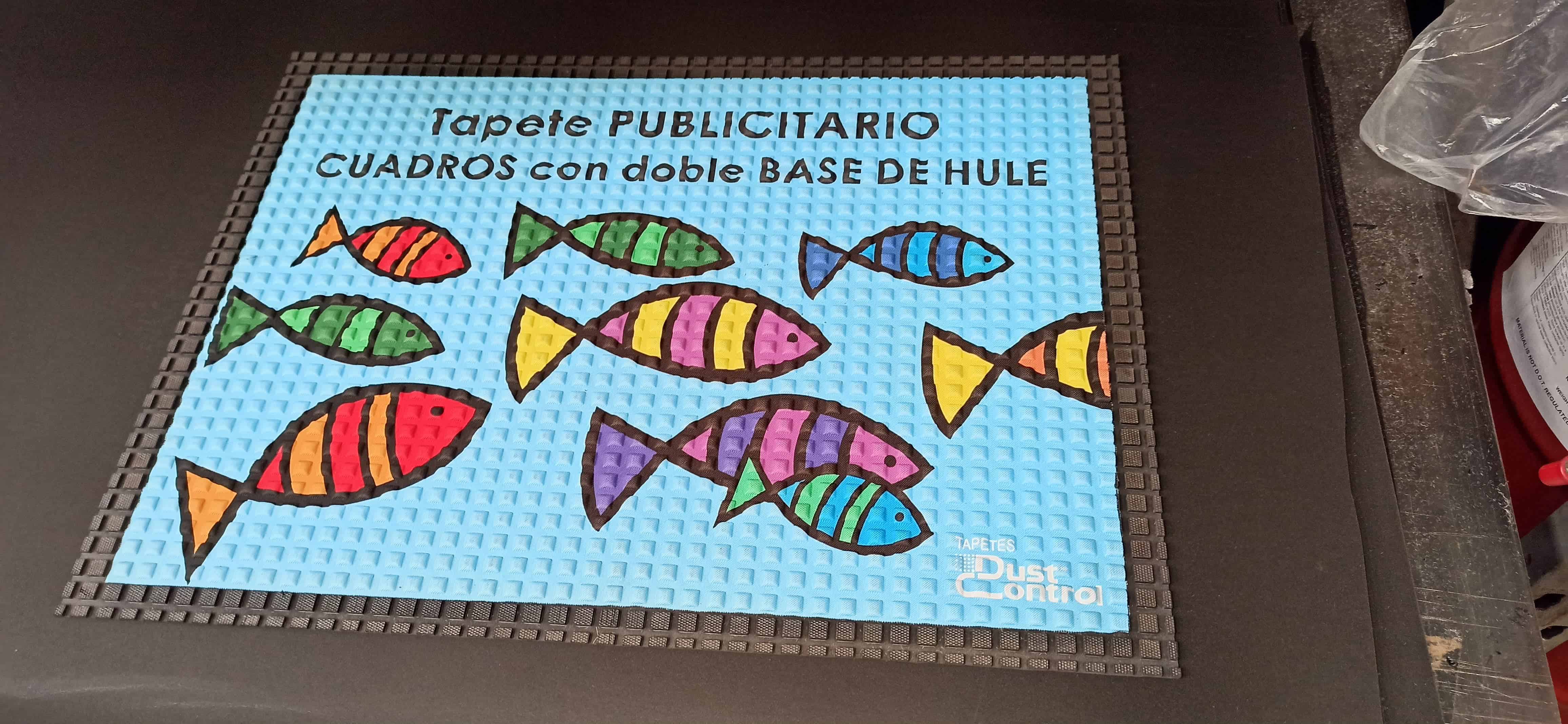 Tapete publicitario con doble base de hule 
