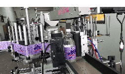 Etiquetadoras para envases caras planas - Industrial Automation System