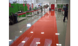 Pisos epóxidos con sistemas antiderrapantes para naves industriales