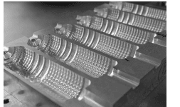 Empaques termoformados para piezas maquinadas reutilizables