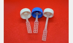 Tapa con espátula aplicadora